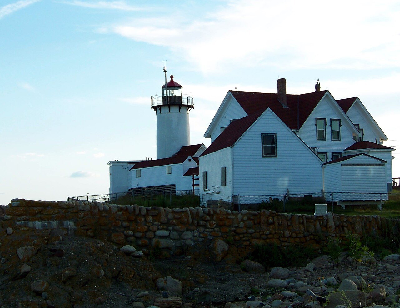 Eastern Point Light and its keeper's house at the mouth of Gloucester Harbor