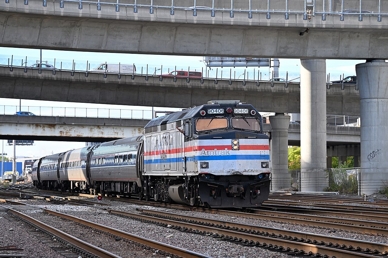 An Amtrak Downeaster approaching North Station beneath the highway