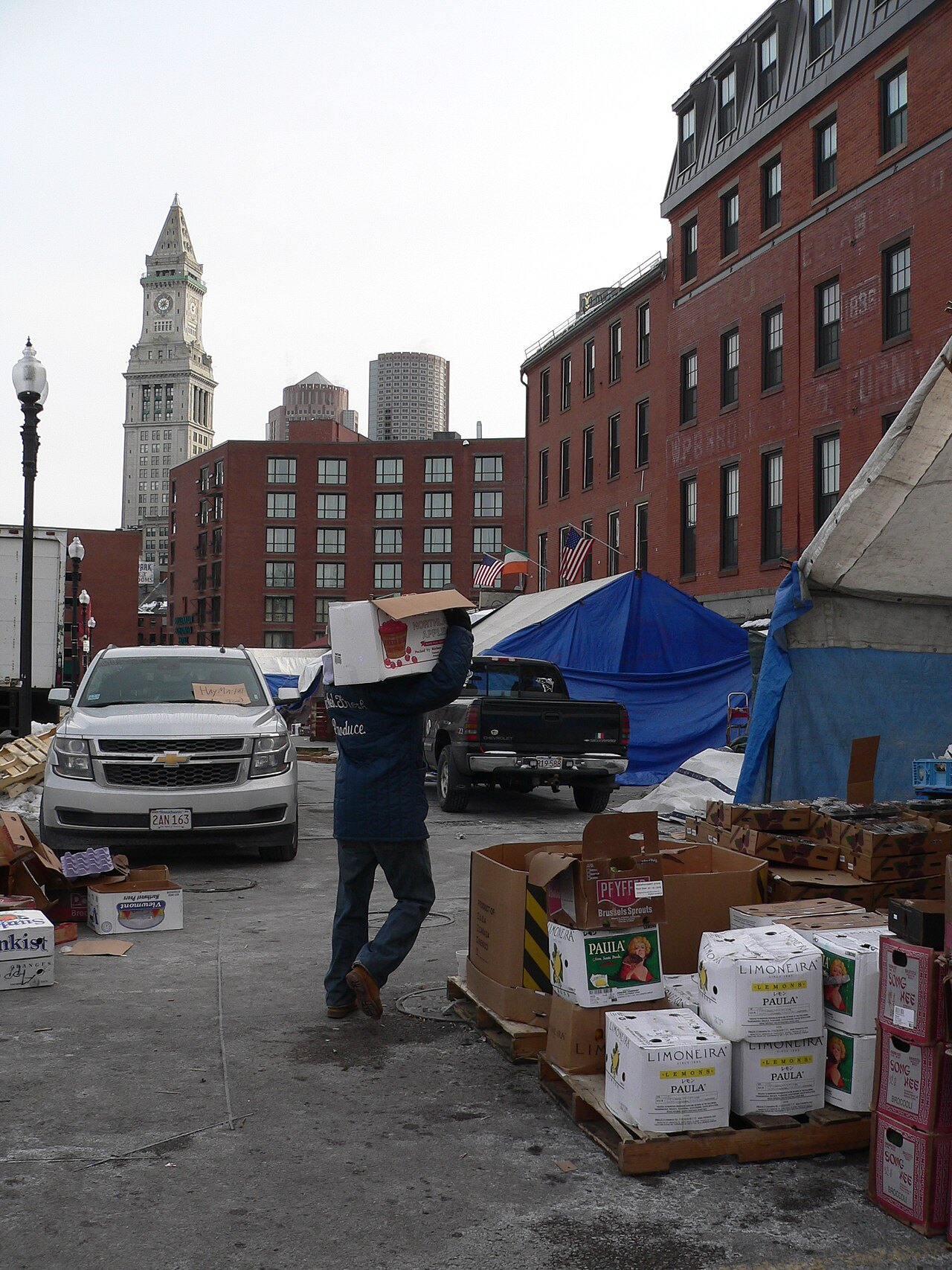 Stalls on Blackstone Street, the Custom House tower beyond