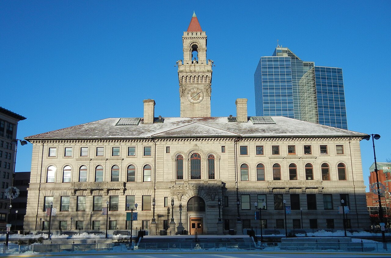 Worcester City Hall and its tower beside the snowy common