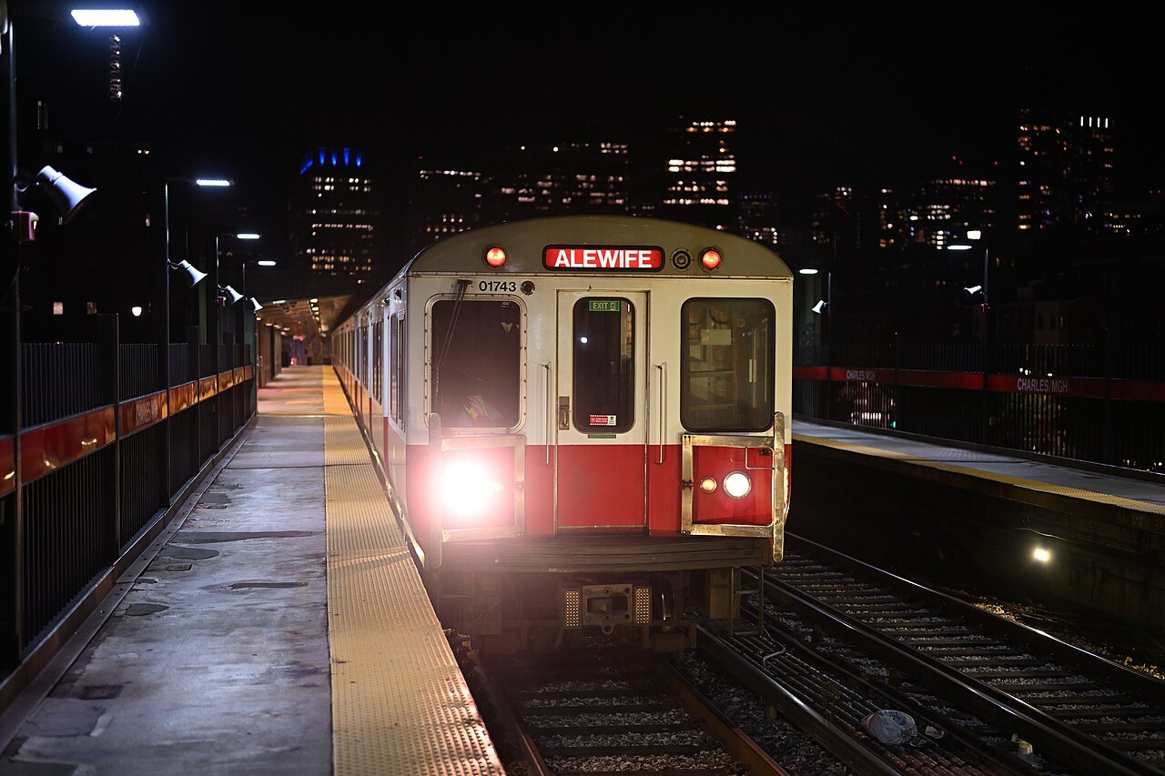 A Red Line train at Charles/MGH station at night