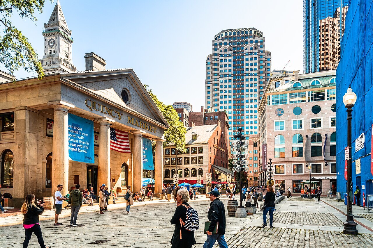The domed Quincy Market behind its granite portico, crowds on the cobbles in front