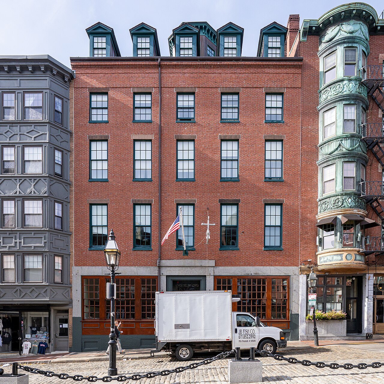 The Mariner's House on the corner of North Square, flags over its door