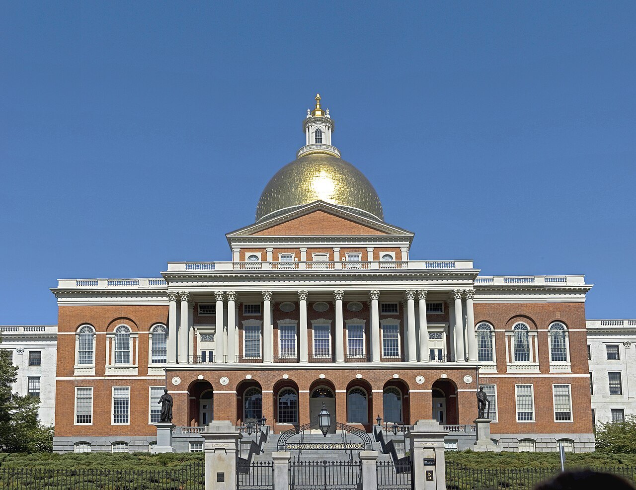 The Massachusetts State House, its gold dome above the portico on Beacon Hill
