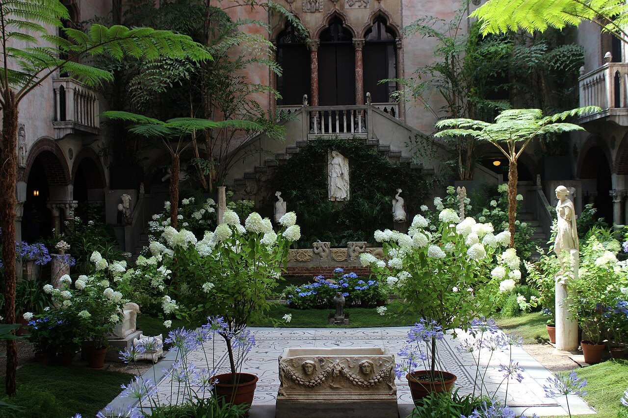 White hydrangeas and a classical statue in the courtyard garden