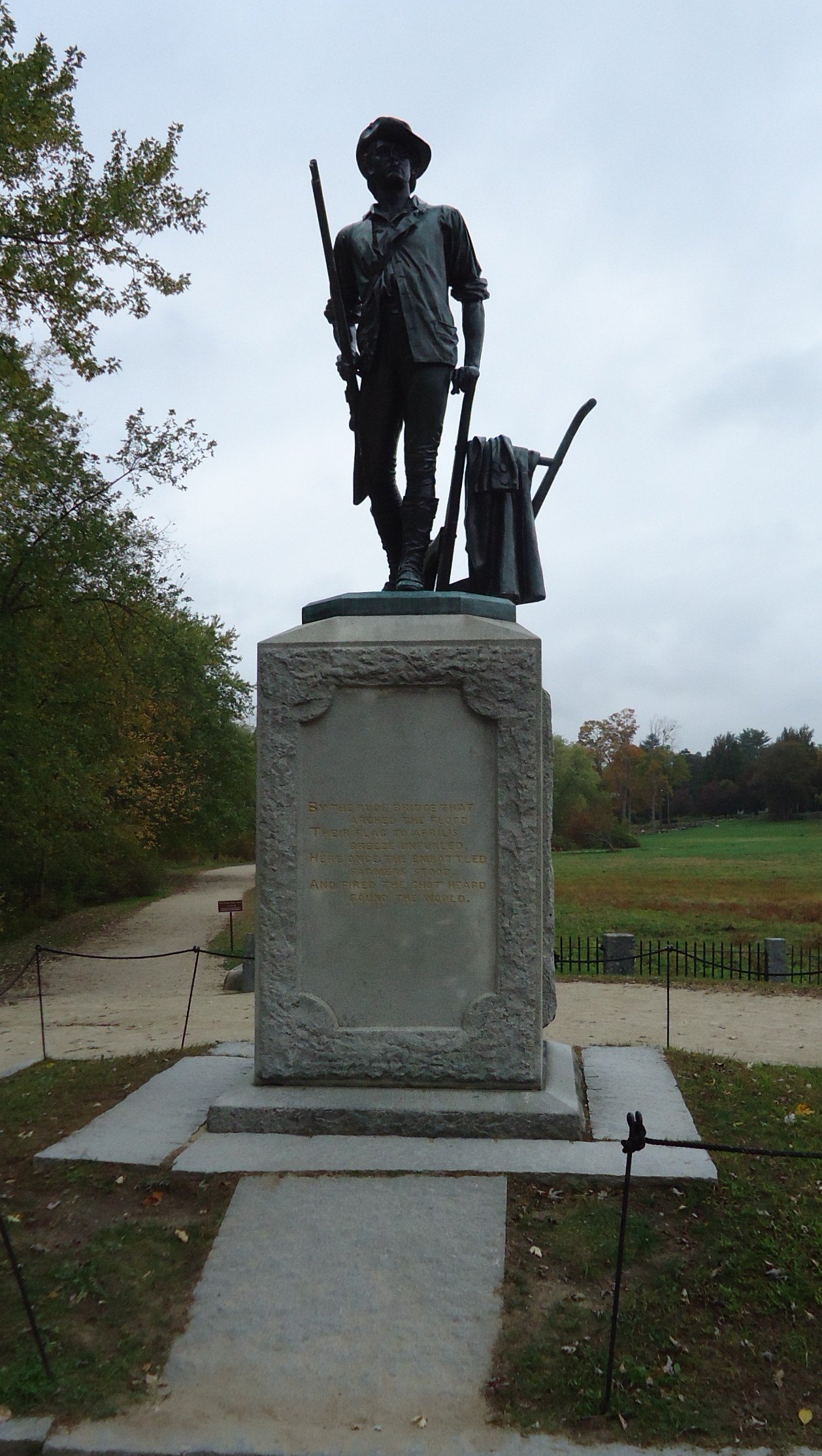 Daniel Chester French's Minute Man statue on its granite plinth near the North Bridge