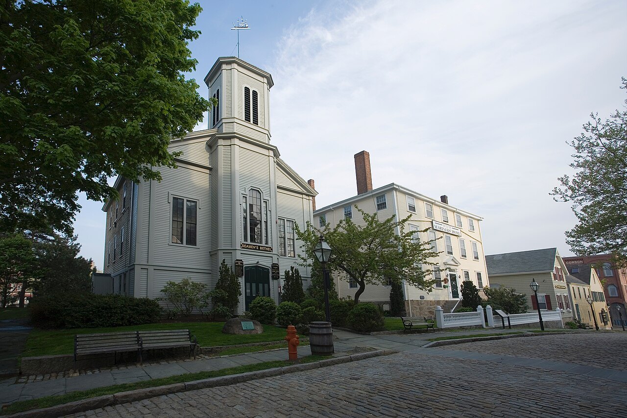 The Seamen's Bethel on Johnny Cake Hill, its white tower above the cobbled street