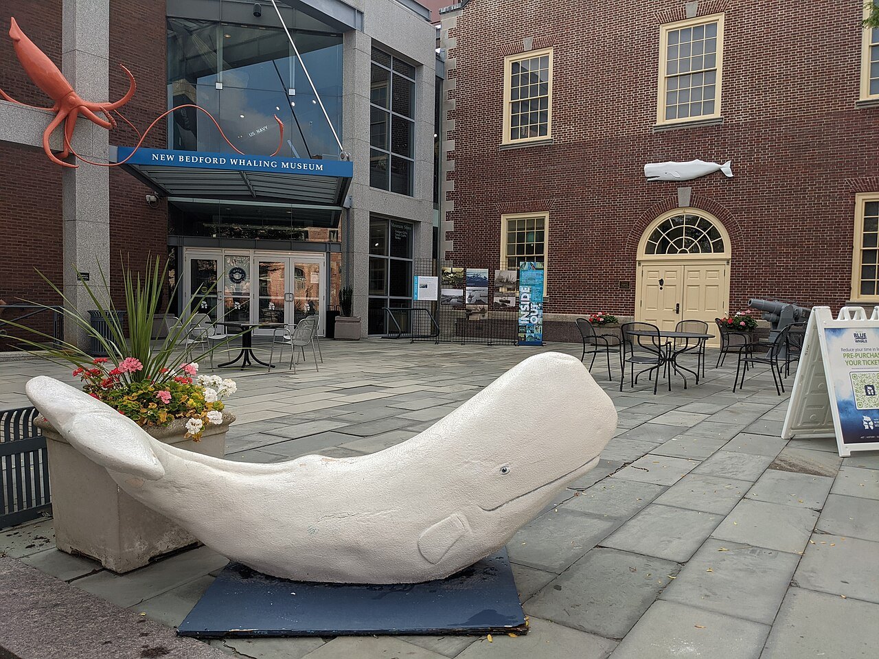 A white whale sculpture on the plaza outside the New Bedford Whaling Museum