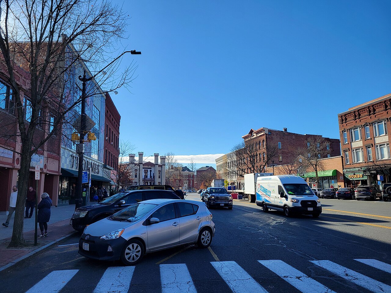 Main Street in Northampton, its brick blocks under a bright blue sky