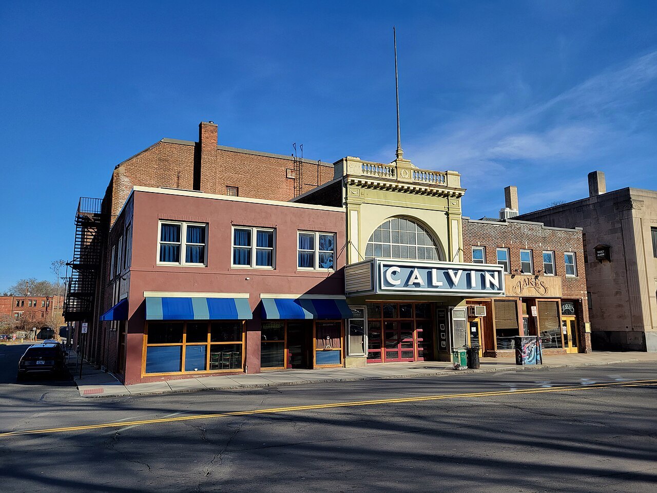 The Calvin Theatre, its marquee over a brick block downtown
