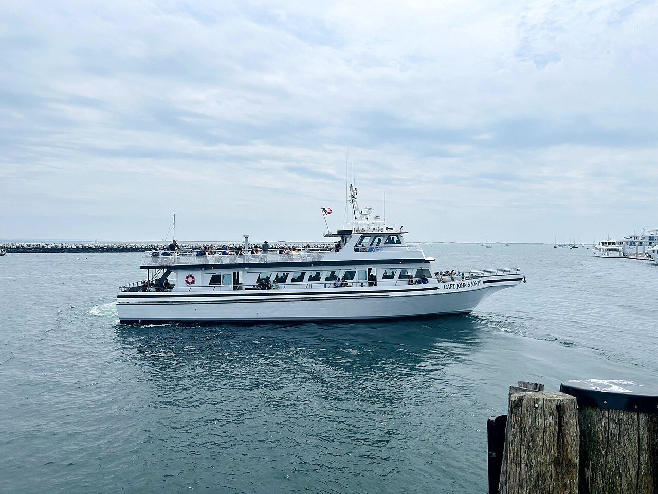 A whale watch boat heading out of Plymouth harbor