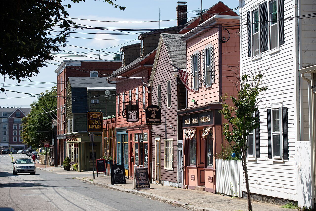 Old clapboard and brick shops along Derby Street