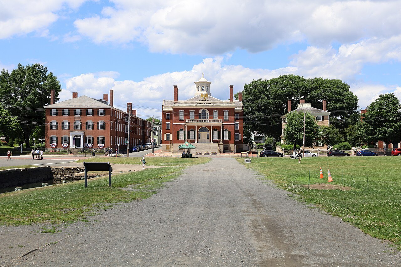 The long lawn of Salem Maritime toward the Custom House and the brick houses of Derby Street