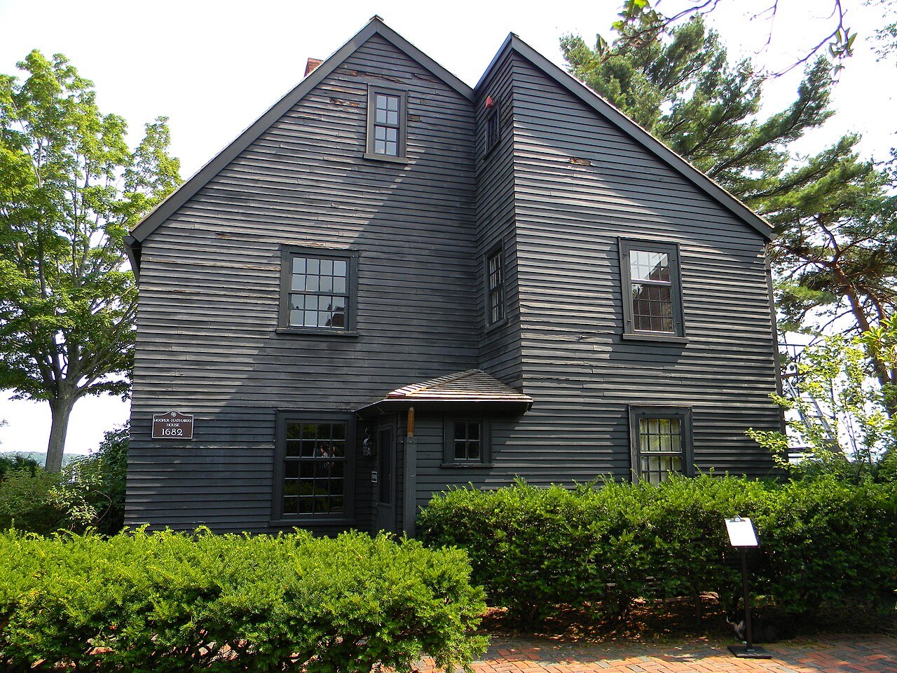 The Hooper-Hathaway House, dark clapboard under steep gables